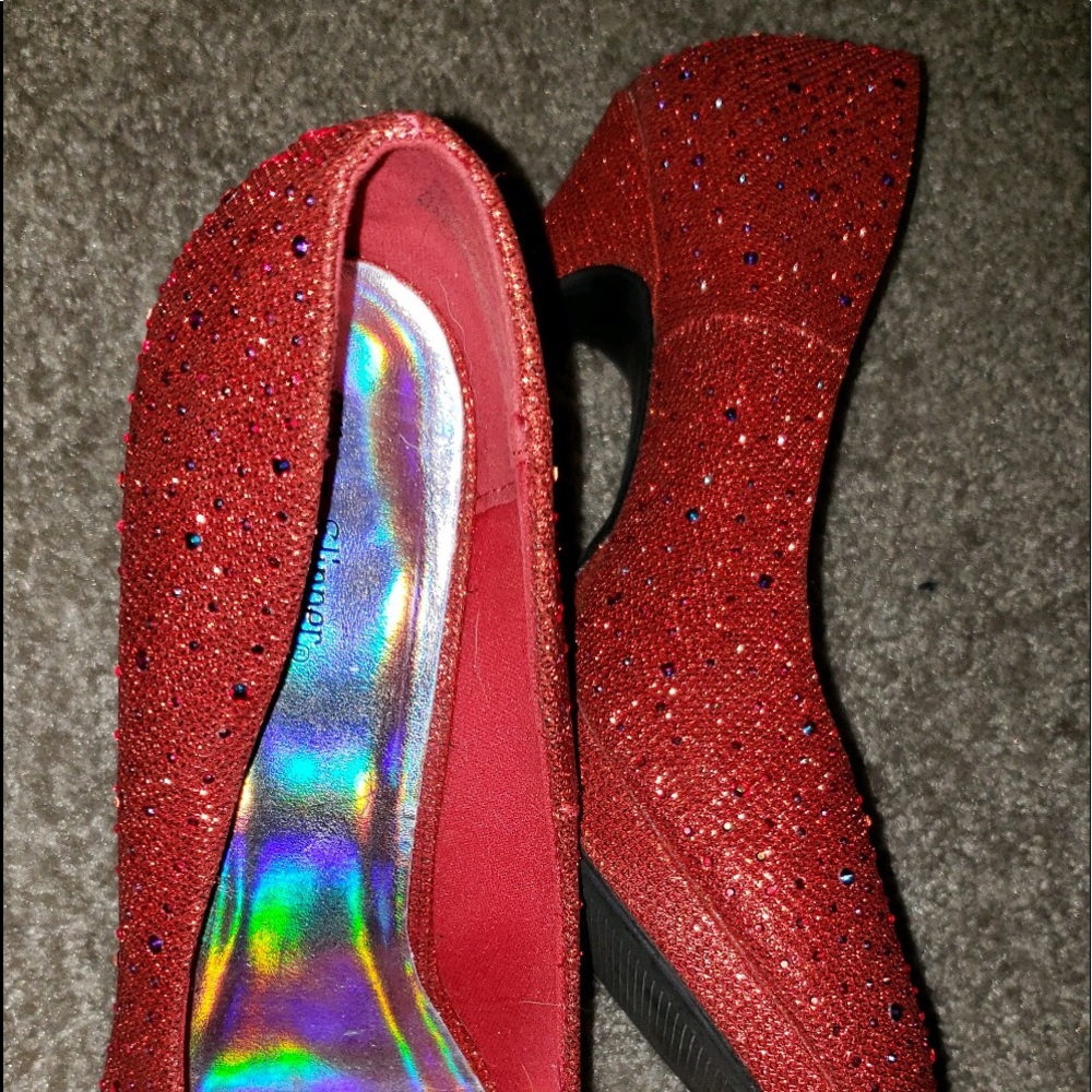 very shiny, red heels 2-3 inches.
